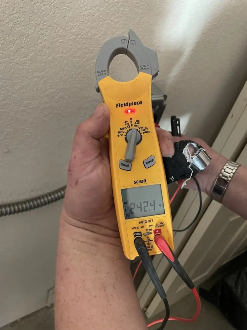 Voltage testing with clamp meter during Generator Installation in Eucalyptus Hills